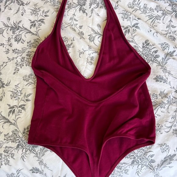 Size Small open back V cut Express thong bodysuit. Tag is cutoff - Picture 2 of 3